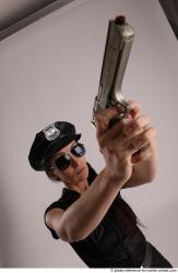 NIKITA STANDING POSE WITH GUN